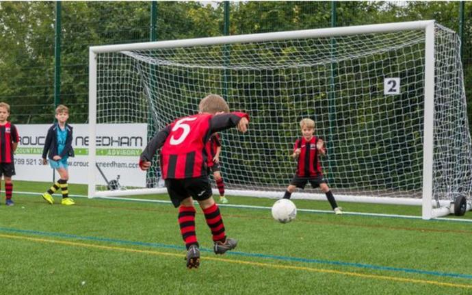 Kids playing football